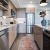 a kitchen with wooden cabinets