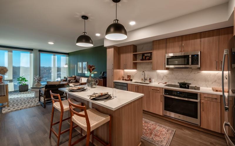 a kitchen with a island and a table