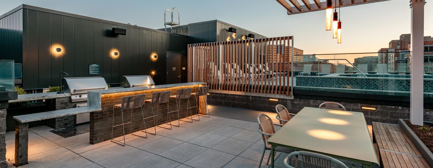 a patio with tables and chairs