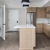 a kitchen with wooden cabinets