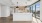 Kitchen with tile backsplash, stainless steel appliances, and under cabinet lighting